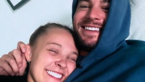 Chris Hughes Gifts JoJo Siwa a Rose Bouquet in PDA-Filled Outing
